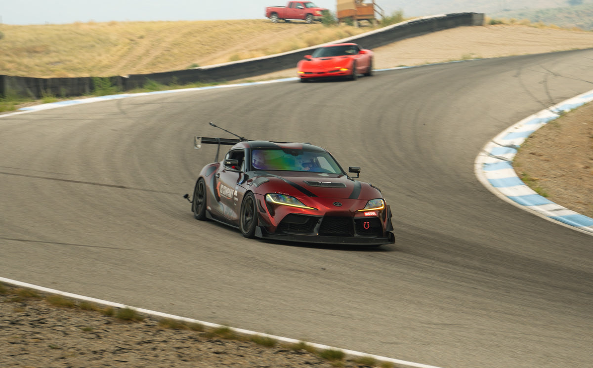 Toyota Supra on track at Area 27 during the August 2026 track day
