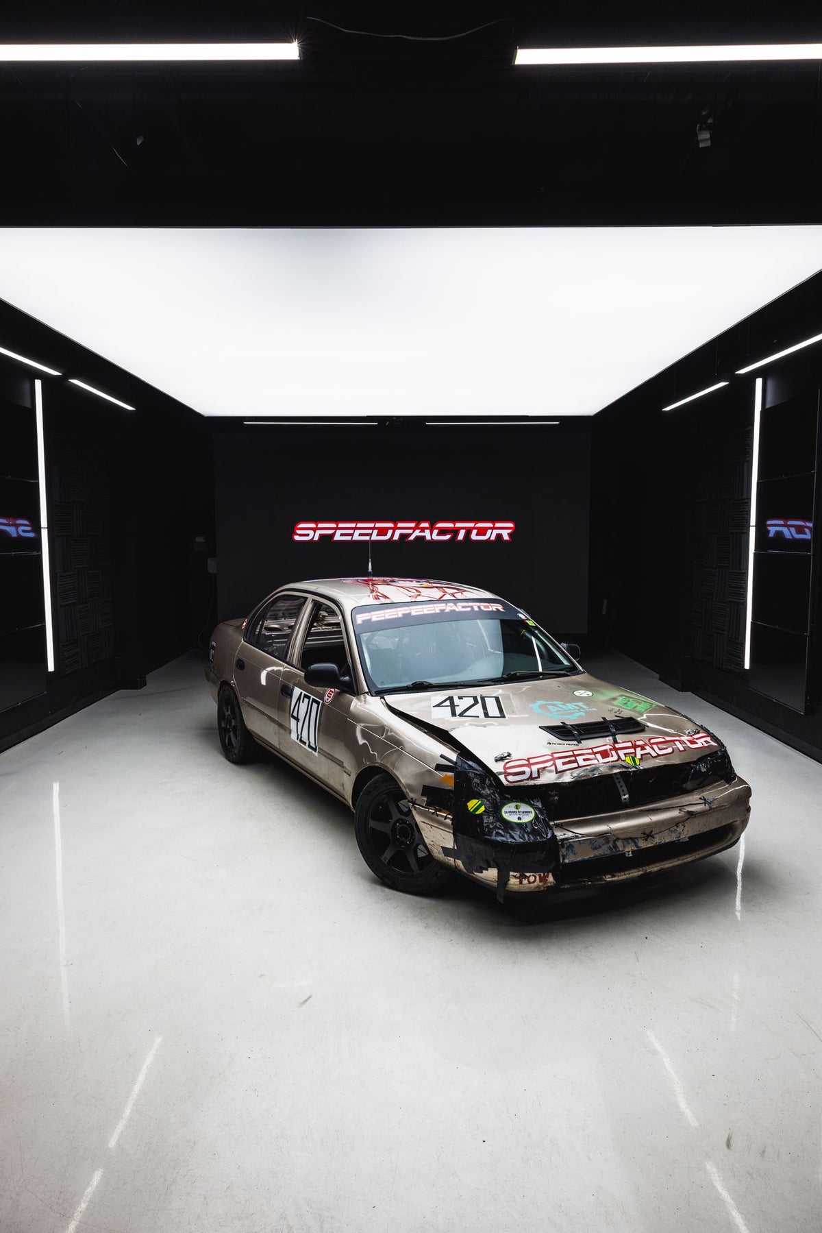 Lemons Corolla front three-quarter in the Speed Factor studio