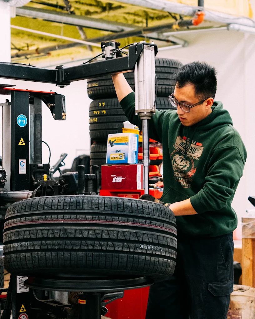 Tire being mounted on a tire changer